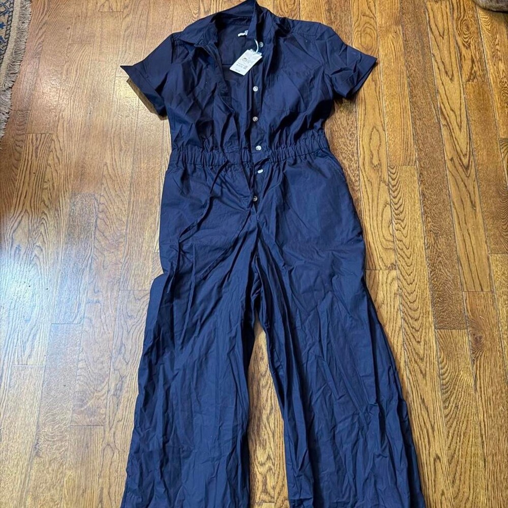 NWT Free Assembly women’s navy blue jumpsuit with pockets and adjustable waistba